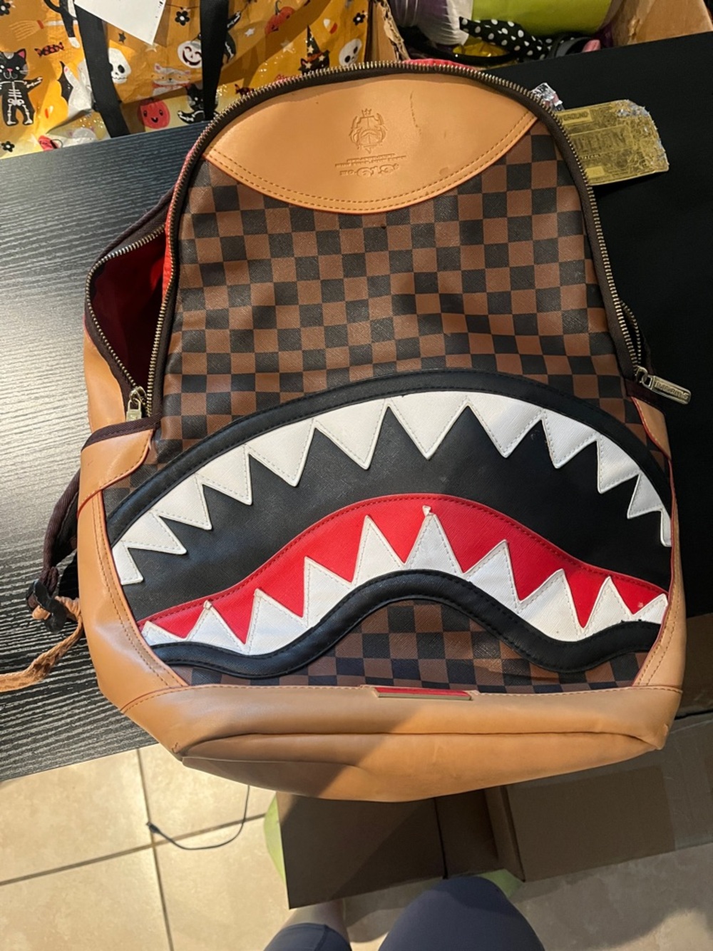 Sprayground Limited Edition Shark Backpack with gold tag